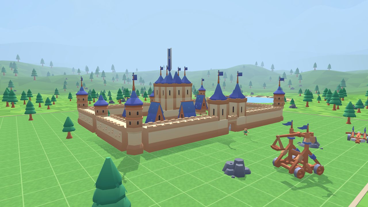 The Royal Castle across the meadow with its gatehouse and keep
