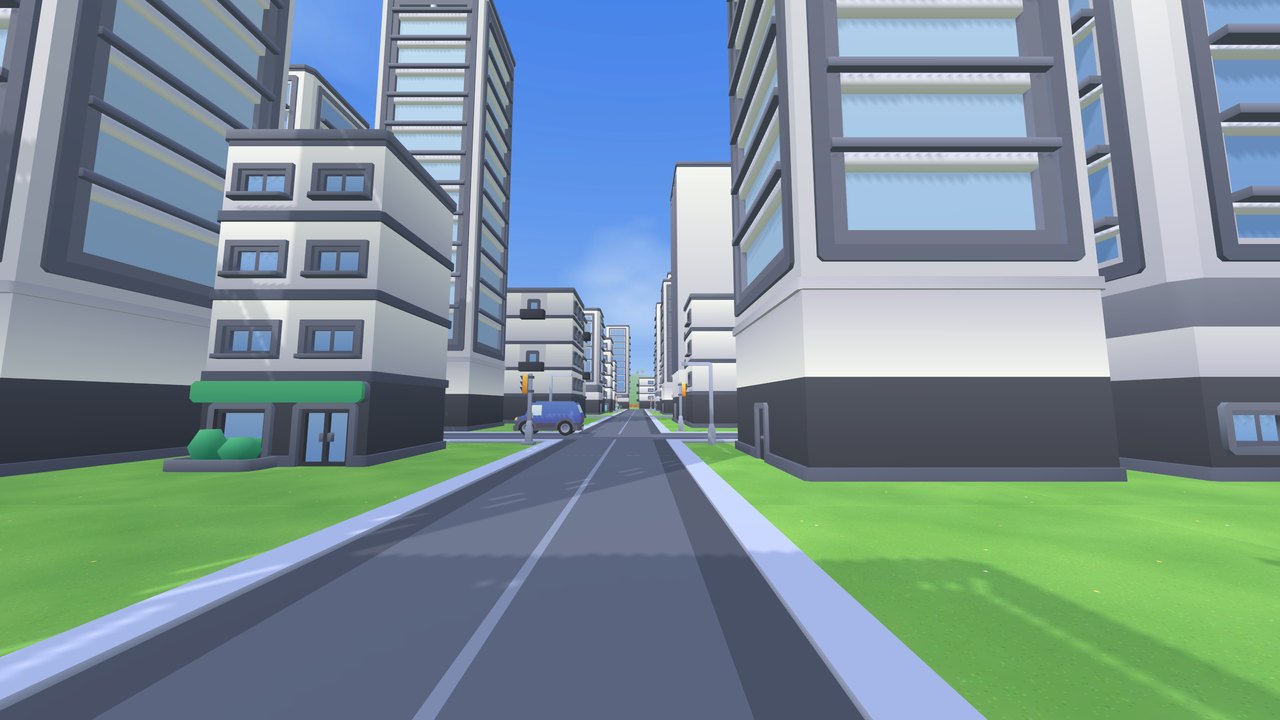 An avenue between the downtown towers with cars passing