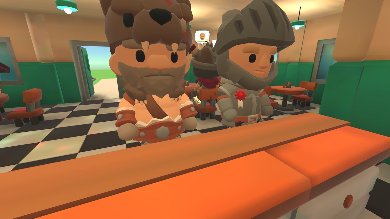 Guests on bar stools across the chef's counter