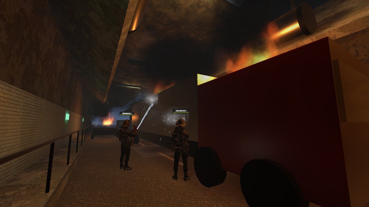 Two firefighters on the burning lorry in the road tunnel