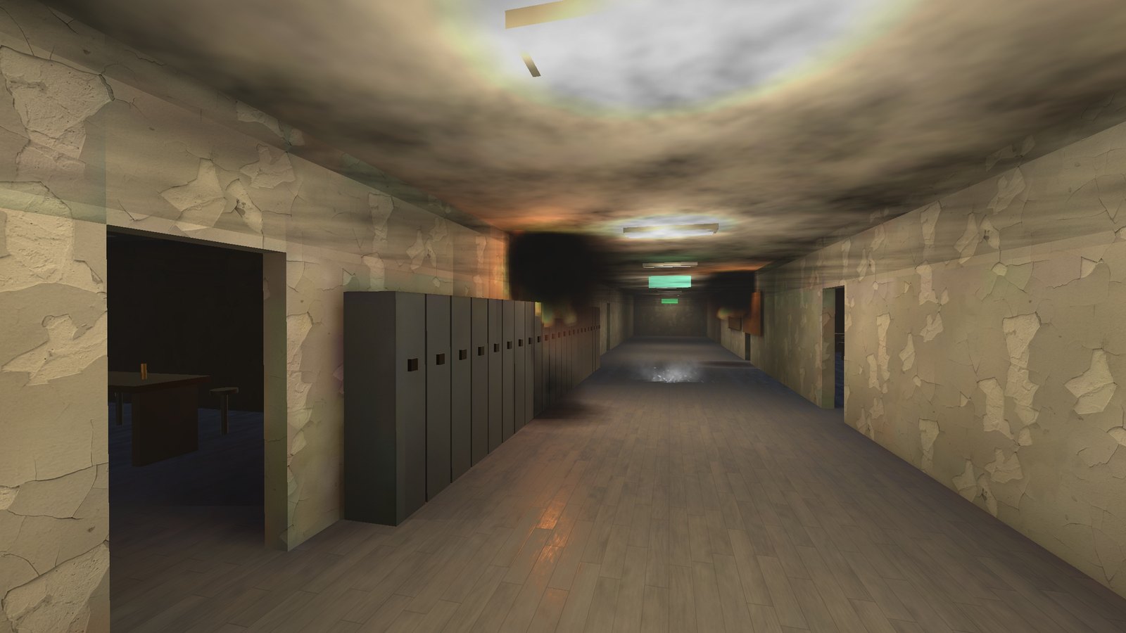 A school corridor with the lockers alight and smoke on the ceiling