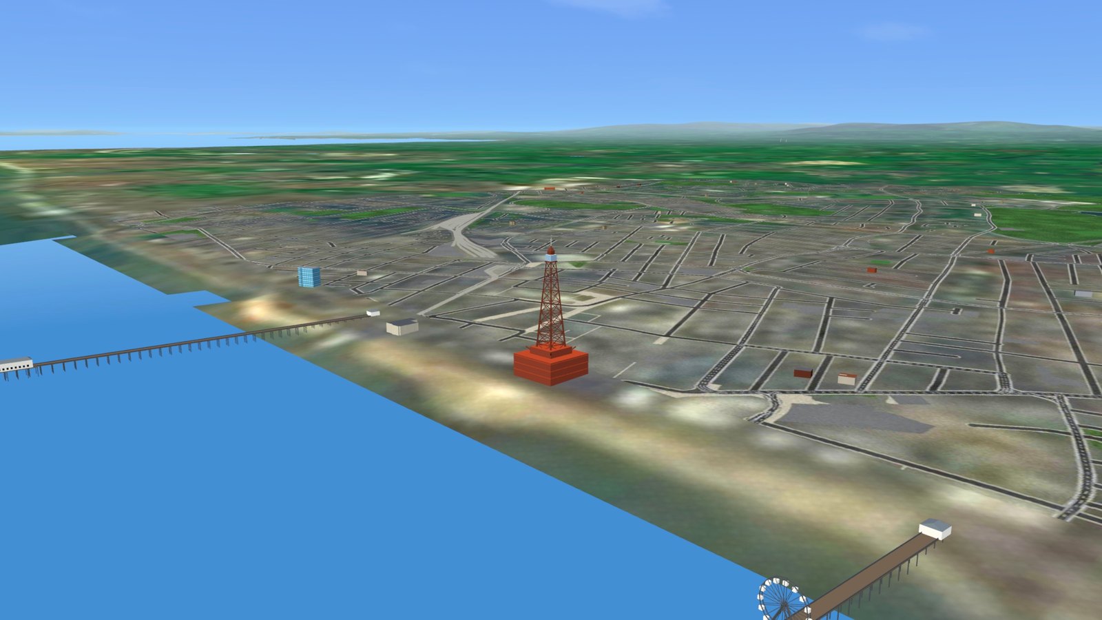 Blackpool Tower and the piers from the air