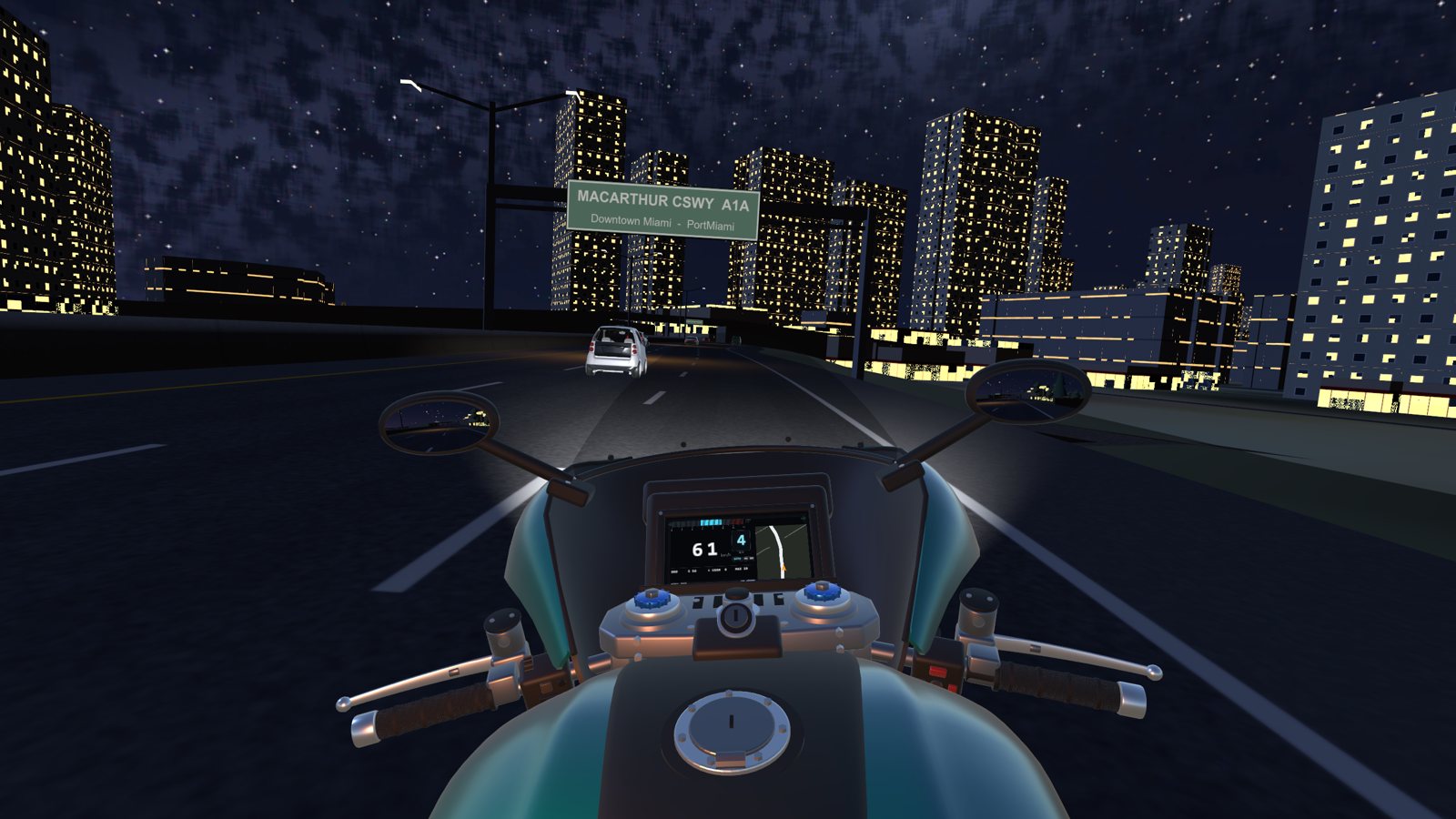 Night on I-395 under the downtown towers