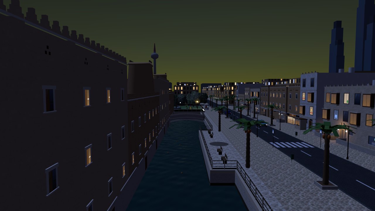 The canal at night with the warehouse windows lit