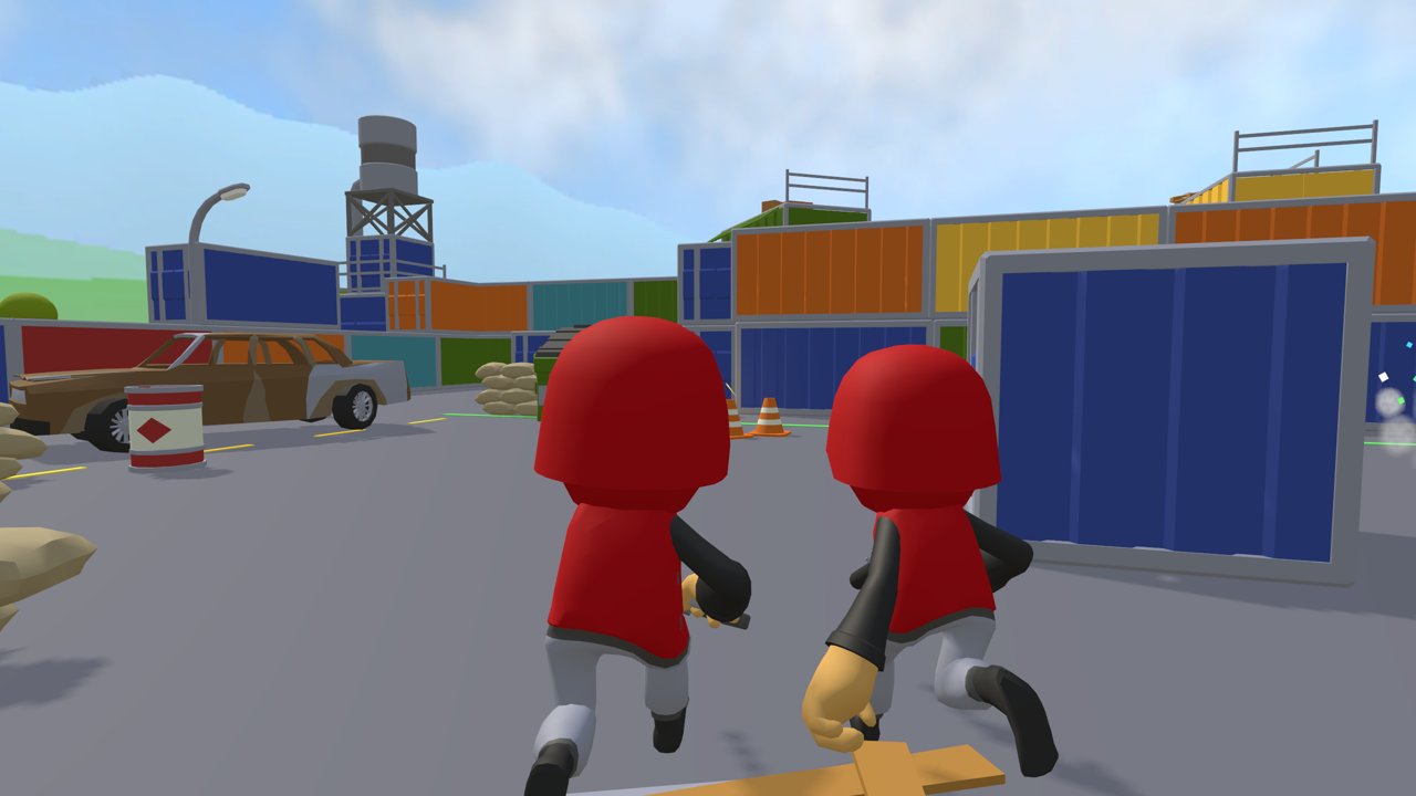 Two red soldiers advancing between the containers