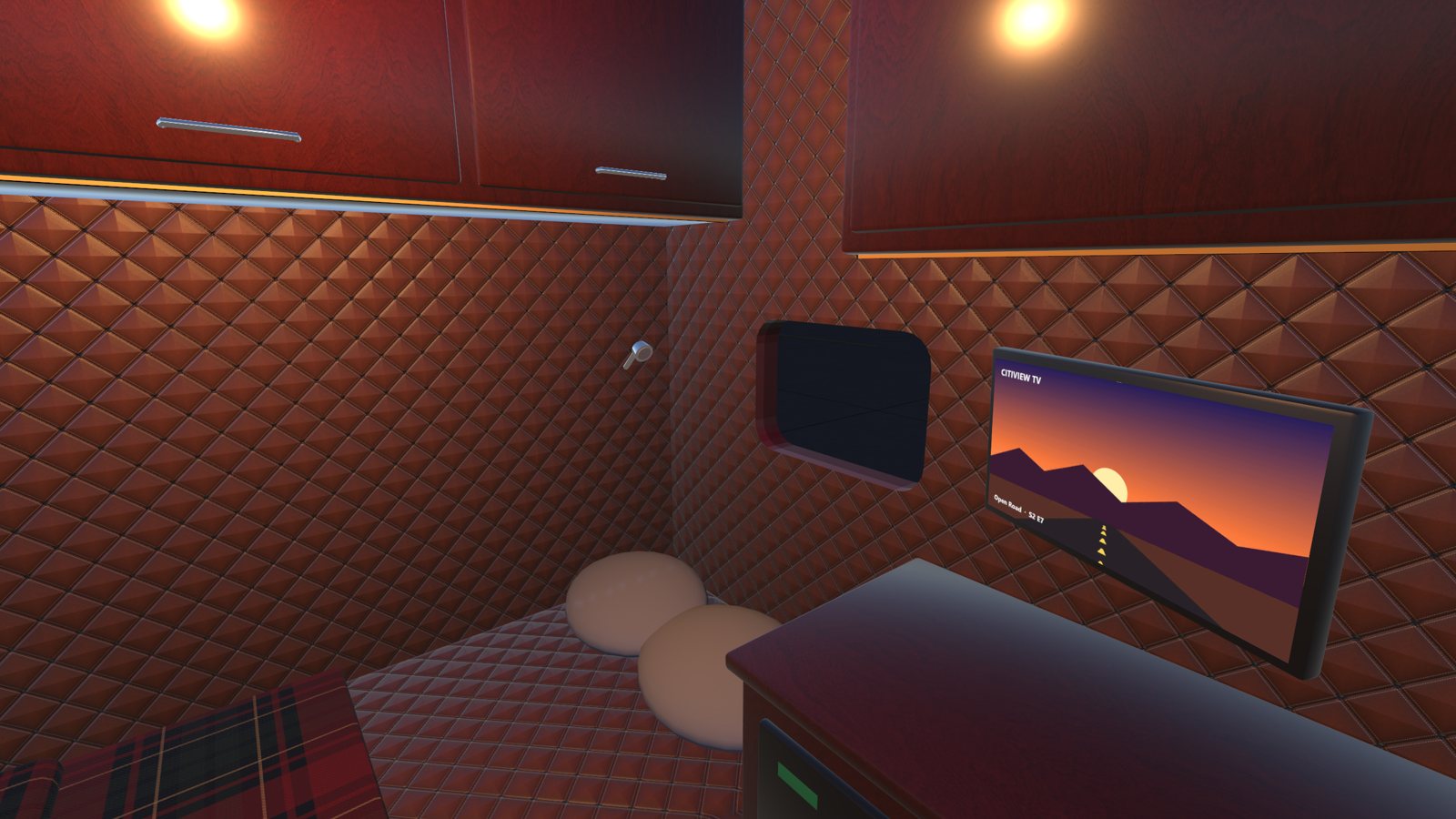 The sleeper: bunk, TV and quilted walls