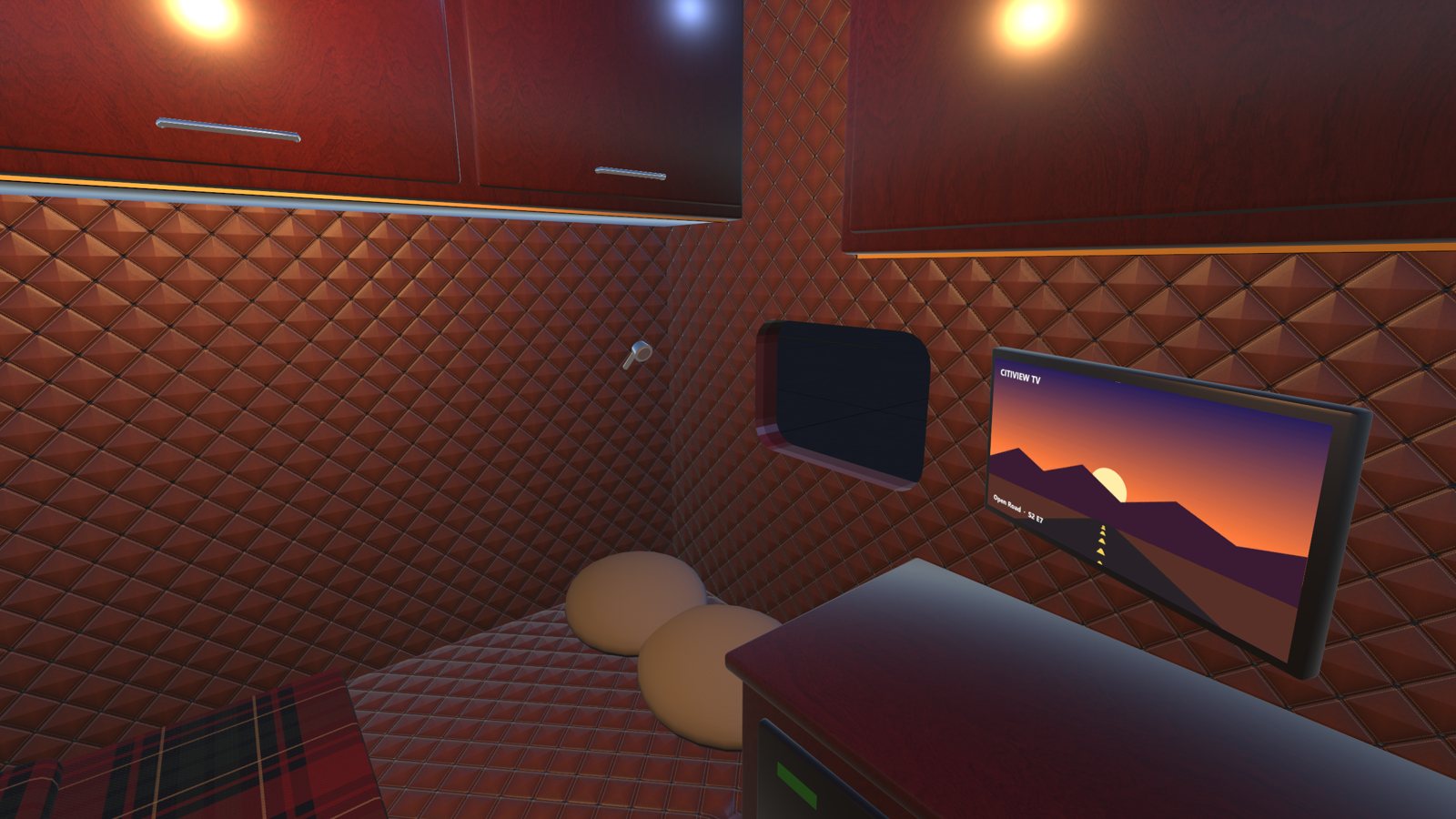 The sleeper: bunk, TV and quilted walls
