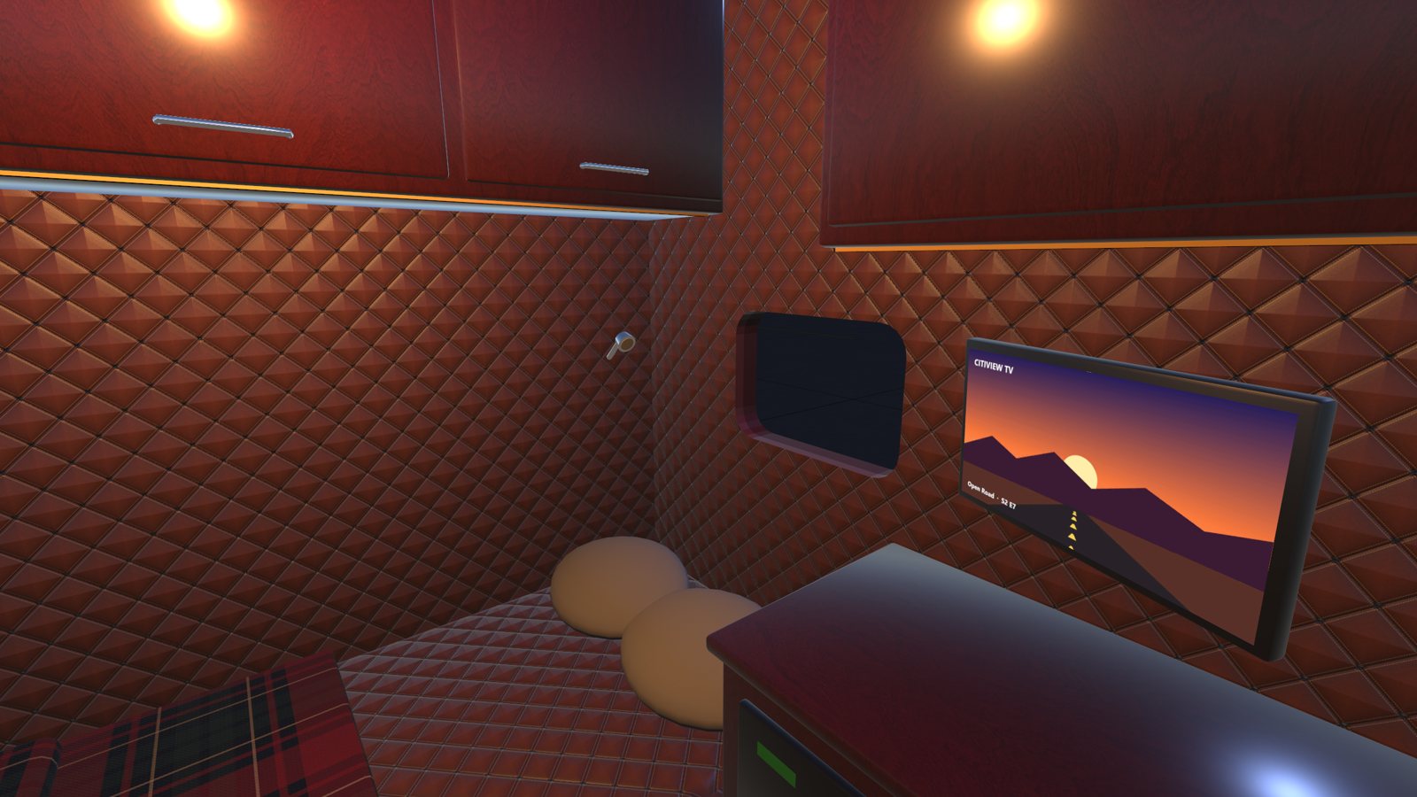 The sleeper: bunk, TV and quilted walls